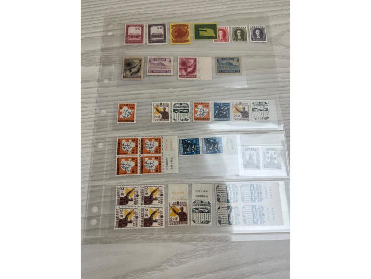 holding in 8 album pages, including the rare 2nd Regular Issue 15c mint. Large quantity. Please view.